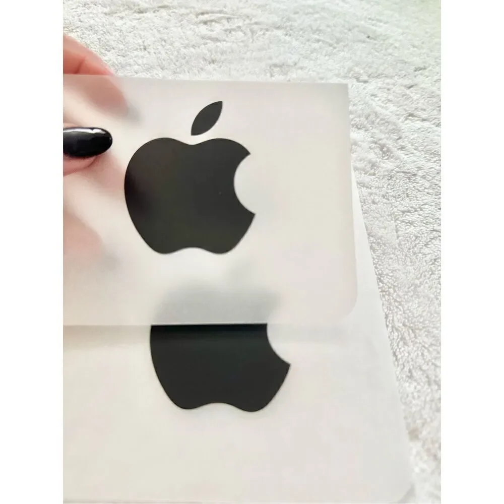 Set of three black apple stickers ￼